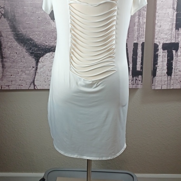 🎉 HOST PICK 🎉 Beautiful Black Woman Ripped Back Tshirt Dress - Picture 5 of 6